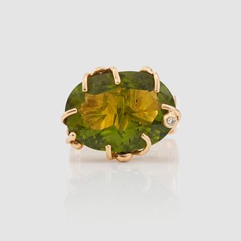 A peridot and single-cut diamond ring.