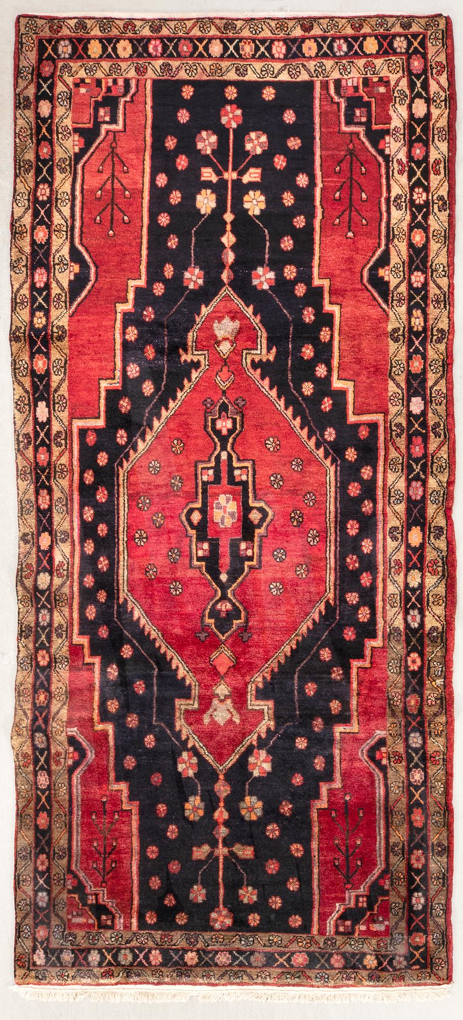 An old Nahavand carpet approx 340x150 cm.
