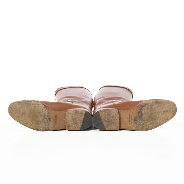 Hermès, a pair of riding boots.