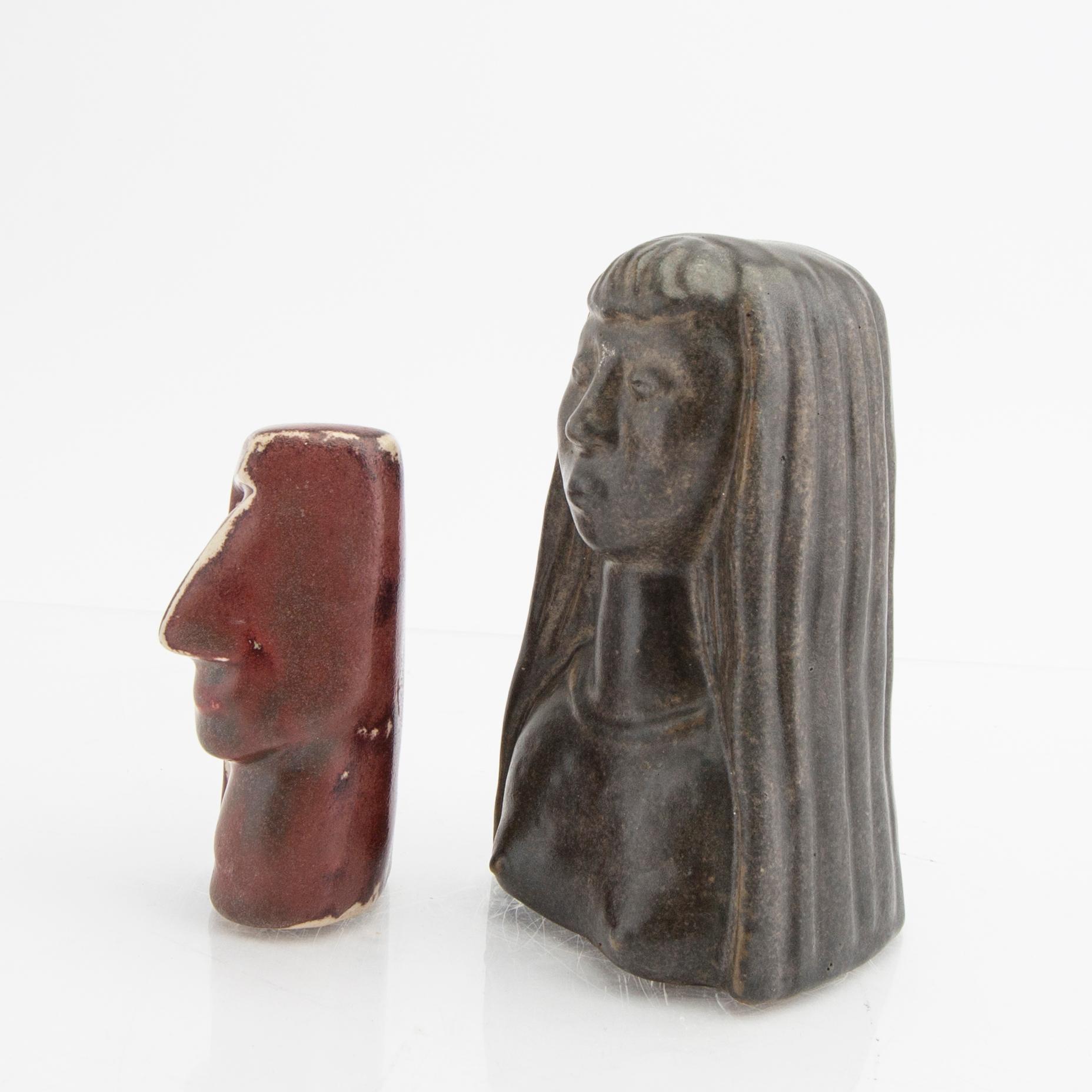 Åke Holm, a set of three signed figurines and a wall plaque.