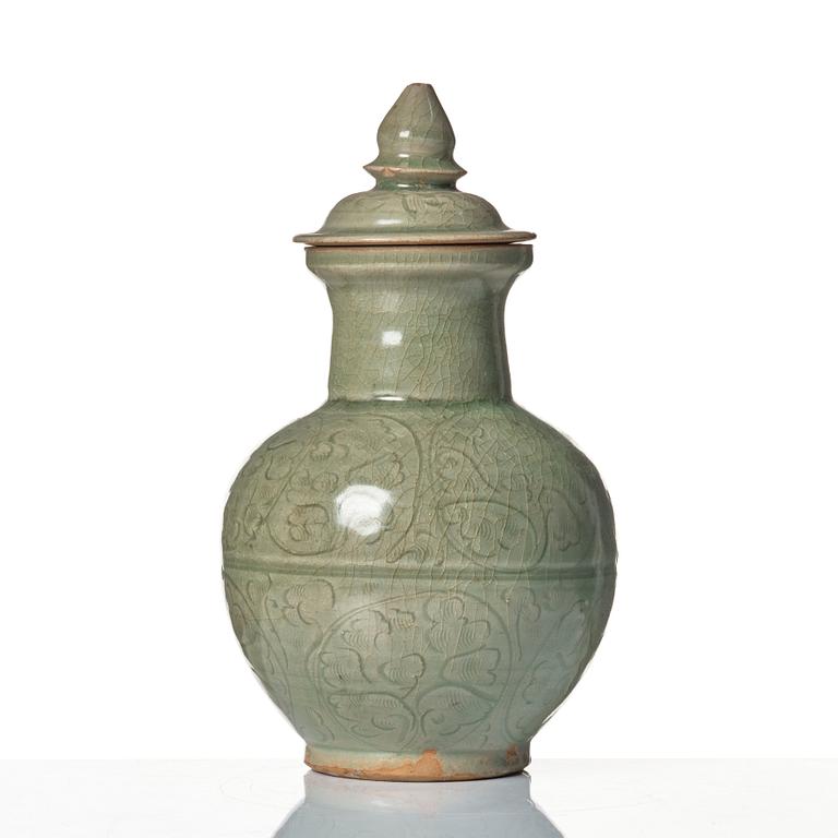 A celadon glazed jar with cover, Yuan dynasty (1271-1368).