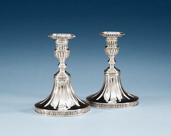 827. A PAIR OF SWEDISH SILVER CANDLESTICKS, Makers mark of Arvid Floberg, Stockholm 1780.