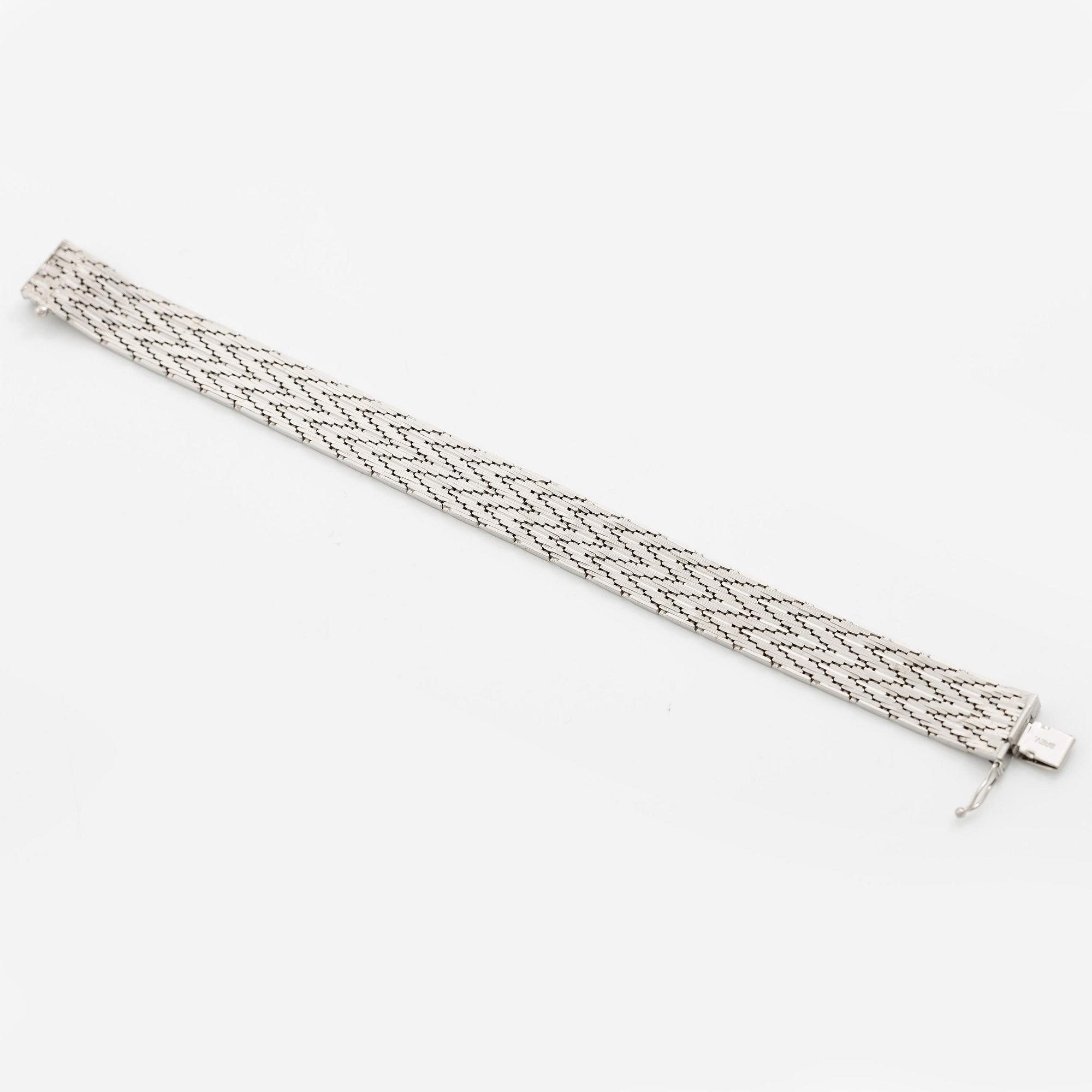 Armband 18K vitguld.