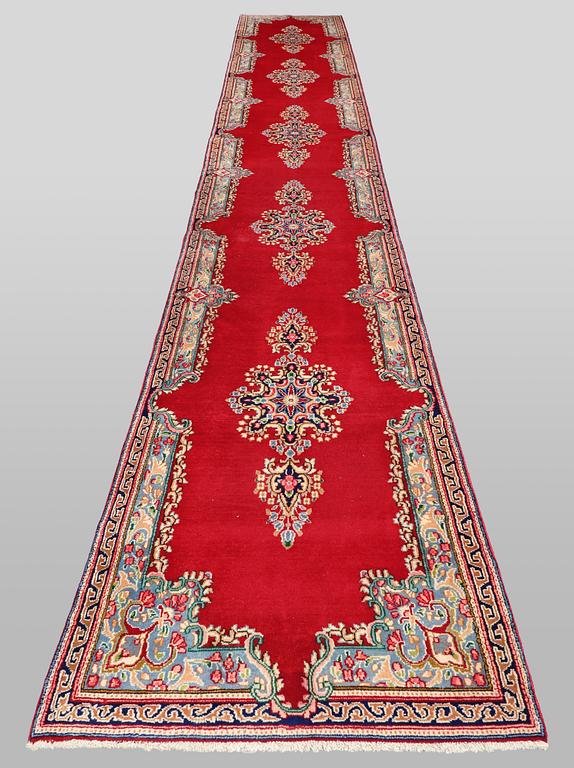 A runner carpet, Kirman, c. 633 x 88 cm.