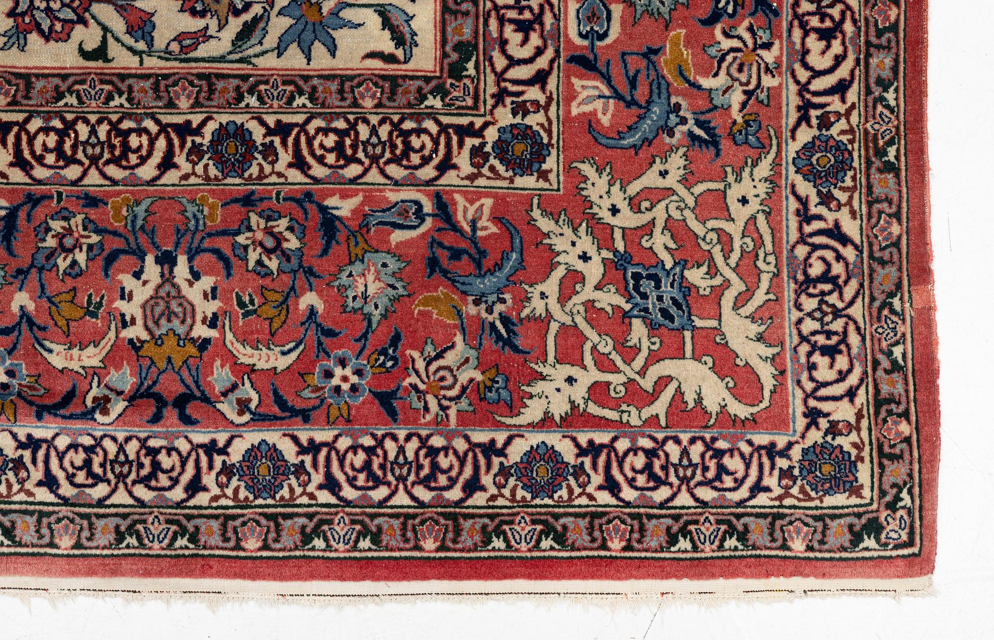 A semi-antique Isfahan carpet, central Iran, c. 325 x 210 cm.