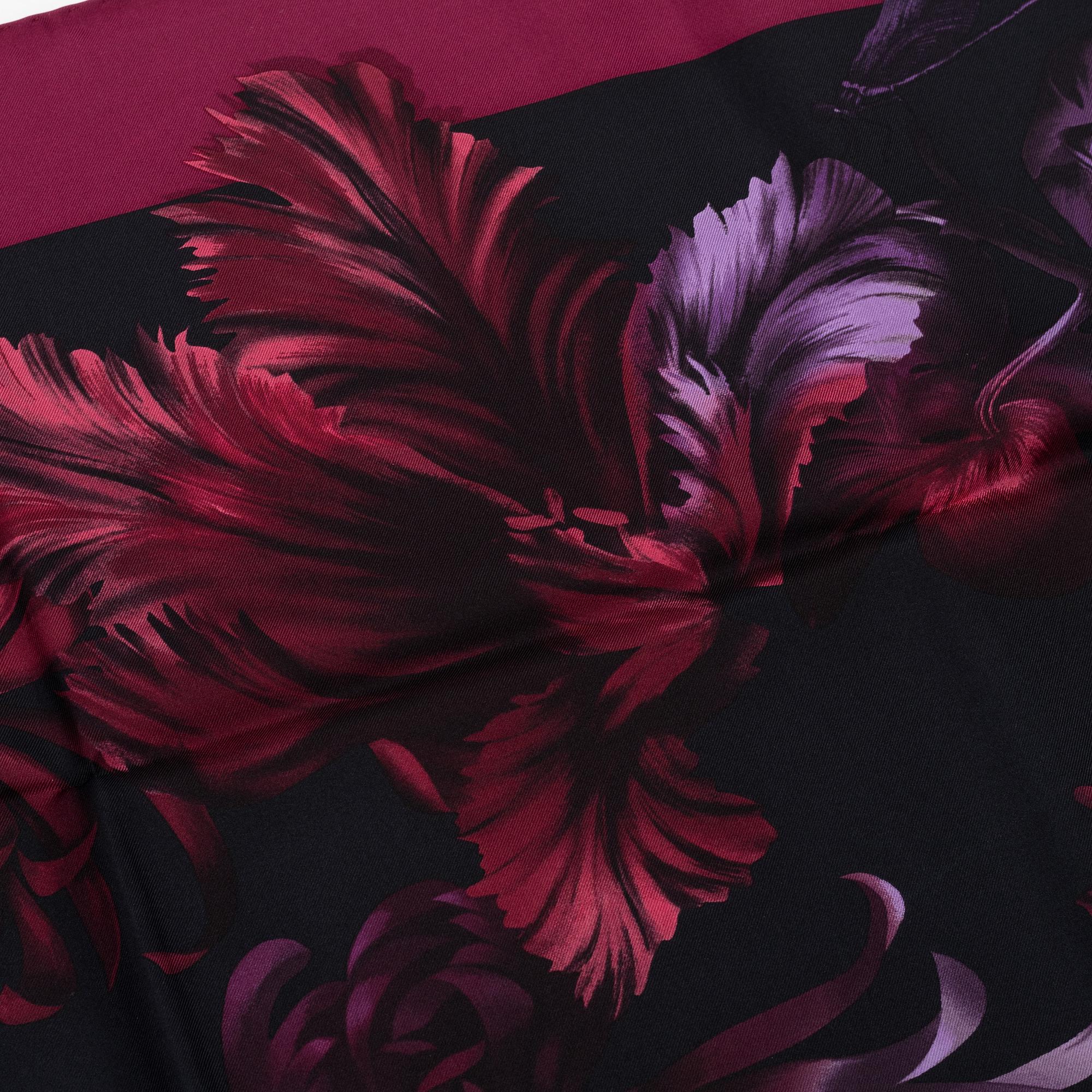 Gucci, a silk scarf.