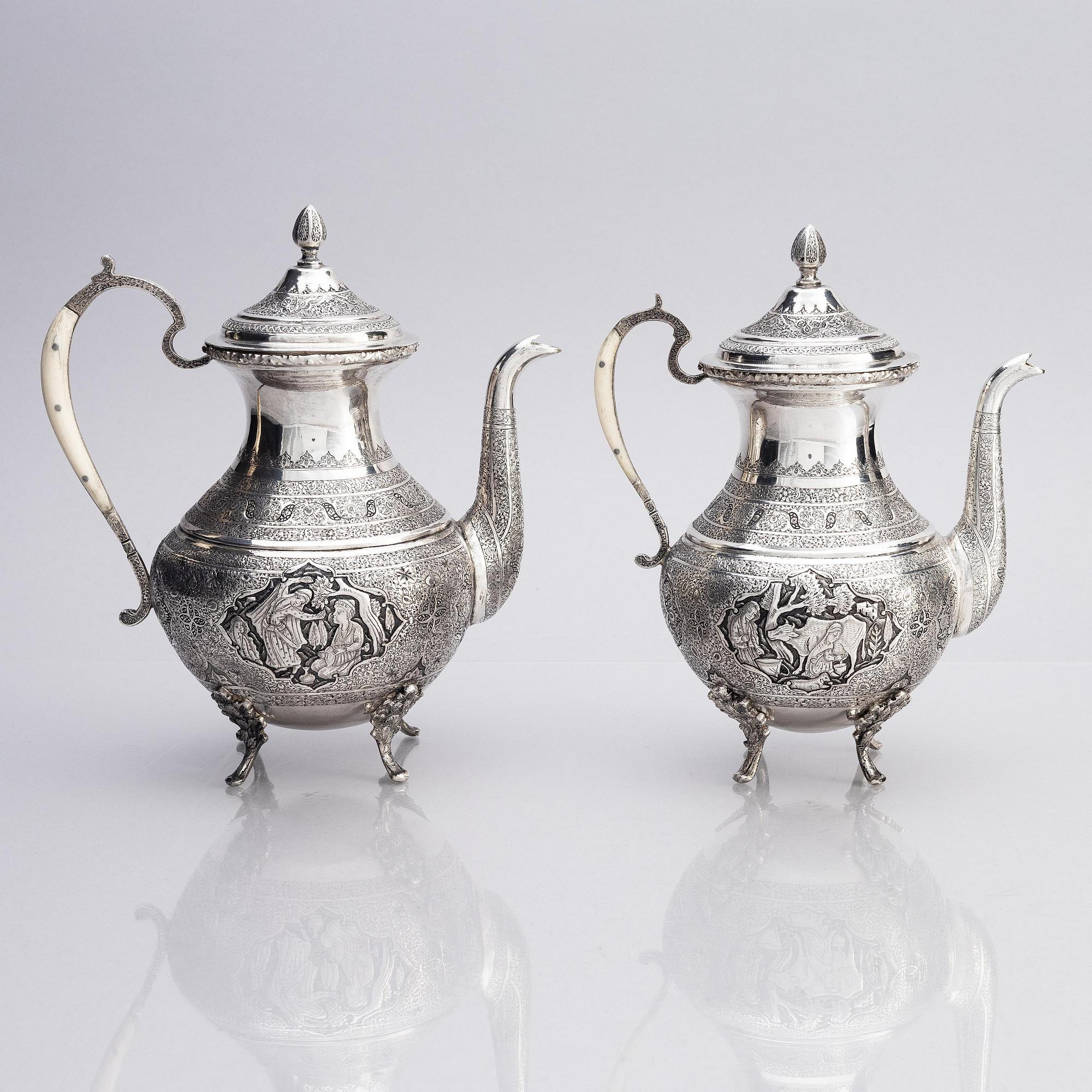 An 84 standard Persian (Iran) silver tea and coffee set, four pieces, first half of the 20th century.