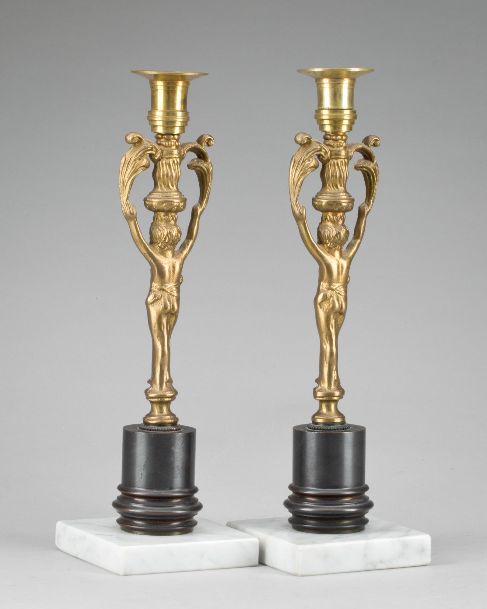 LJUSSTAKAR, ett par, empirestil, omkring 1900.