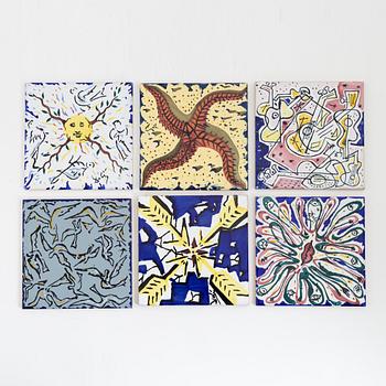 A set of six earthenware tile plates, after Salvador Dalí, late 20th century.