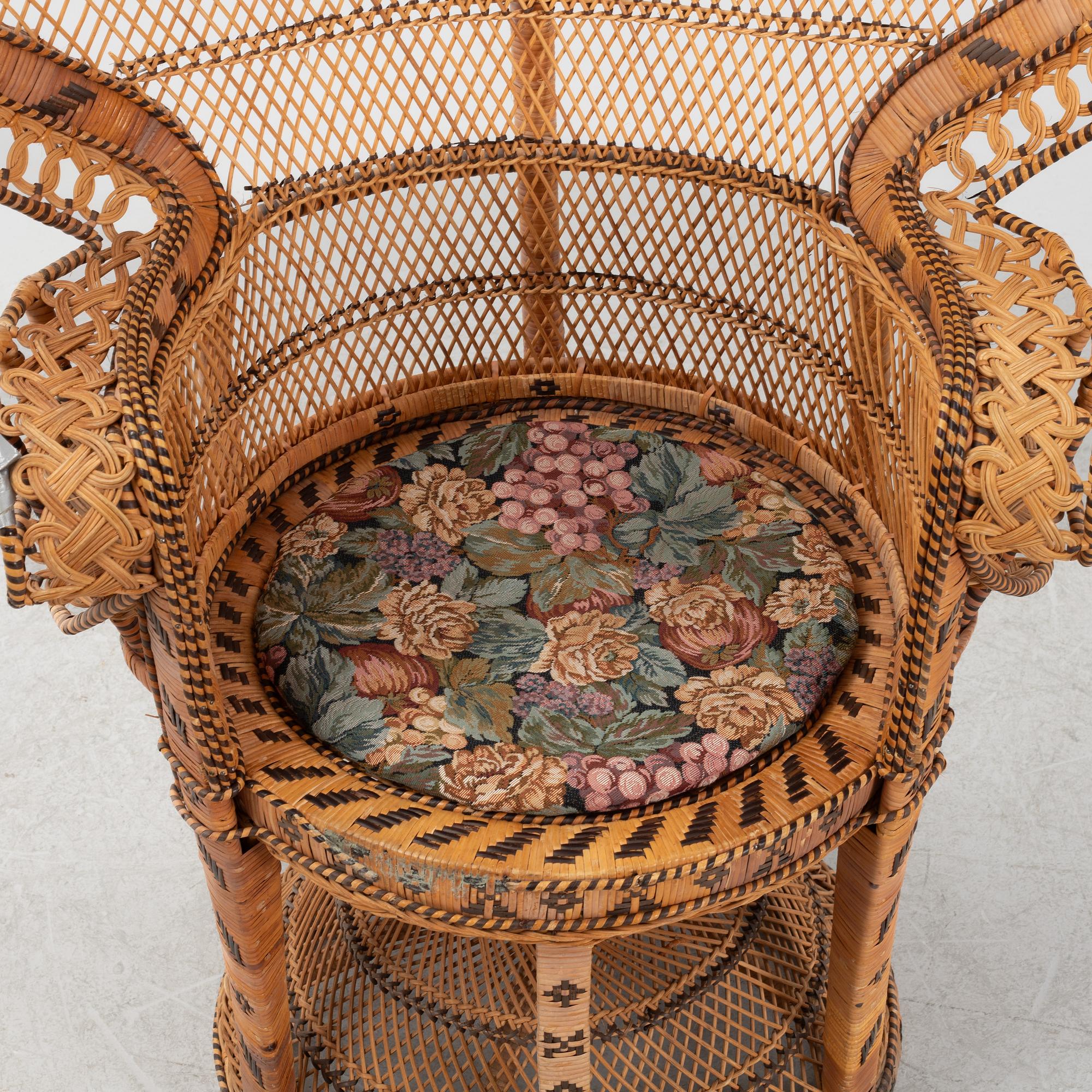 A peacock rattan chair, 20th Century.