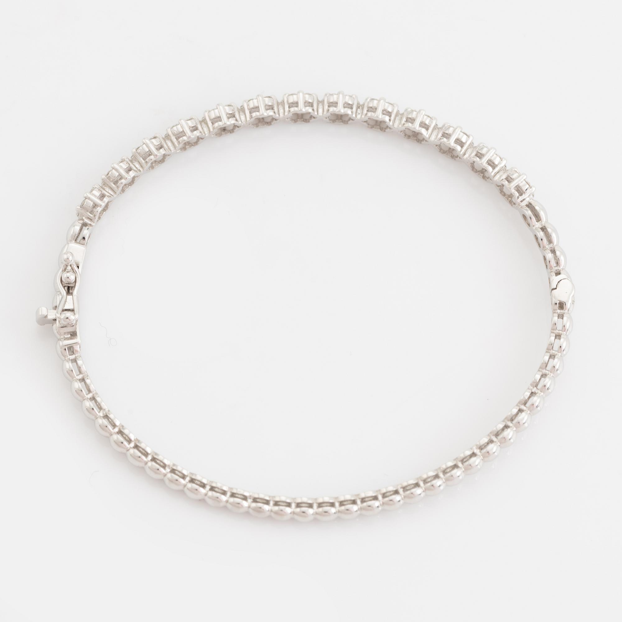 Brilliant cut diamond bangle.