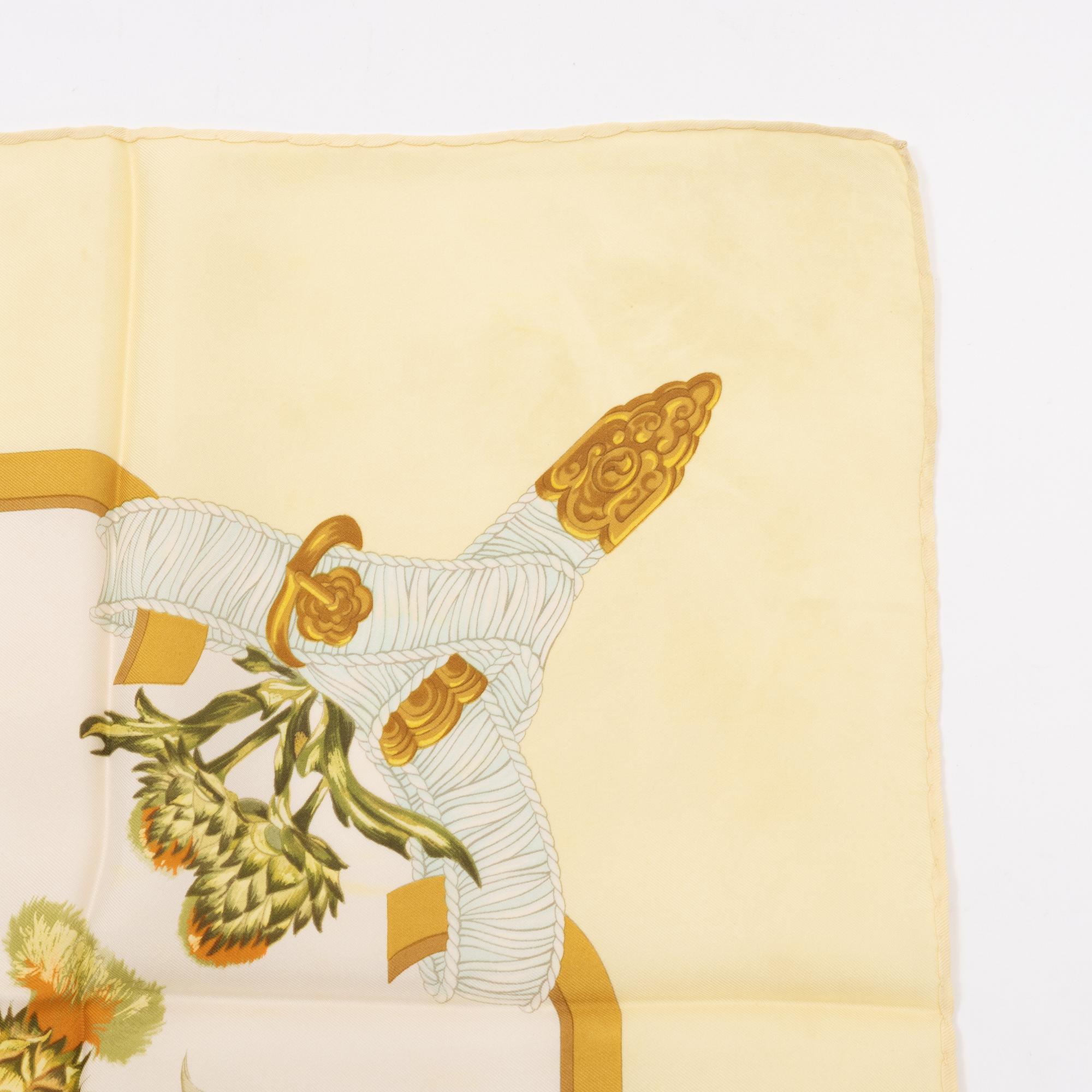 Hermès, a 'Regina' silk scarf.