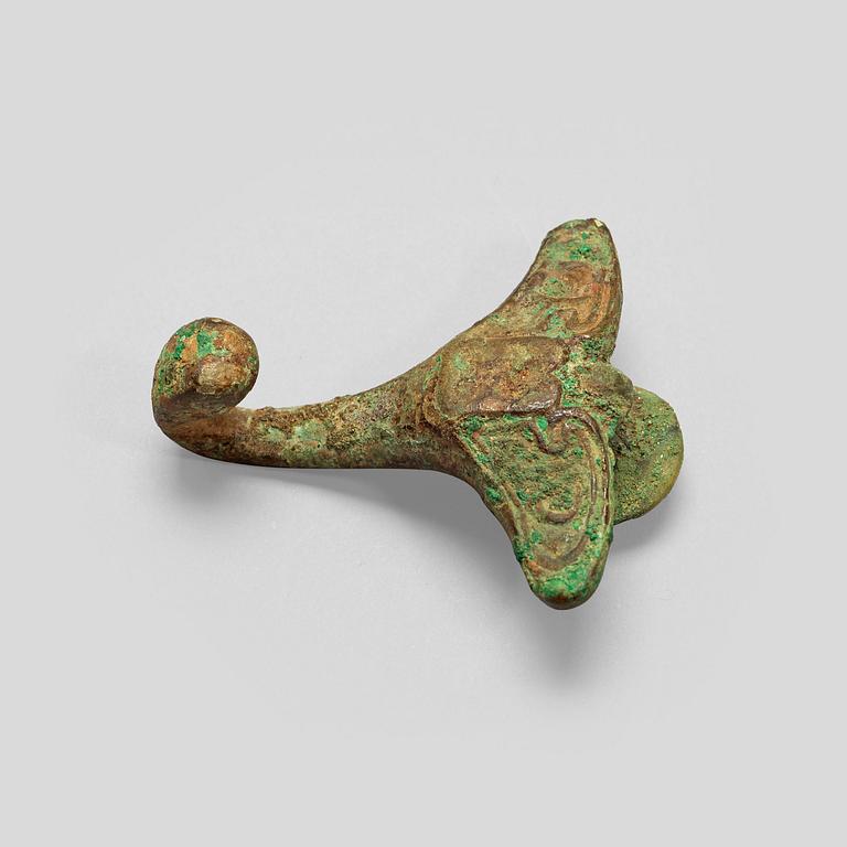 A bronze belt-hook, Zhou Dynasty (c. 1050-221 BC).