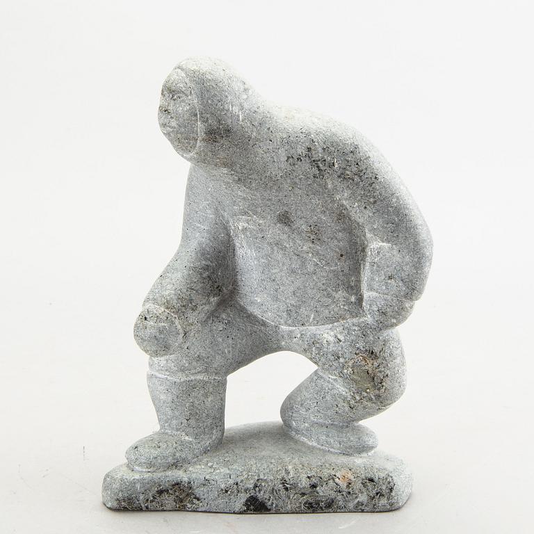A simon Kristofferson signed stone figurine.