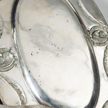 A Rococo style silver sauce boat with dish, 20th Century.