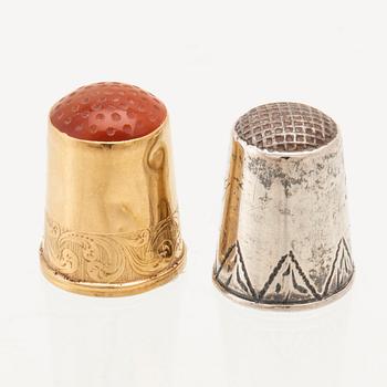 Thimbles, 2 pcs, 18K gold and likely carnelian, Lars Larsson & Co Gothenburg 1848 silver Eman Lindström Söderköping 1918.