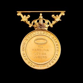 MEDALJ, 18 k guld, Gustaf V, 1947. Vikt ca 19 gram.