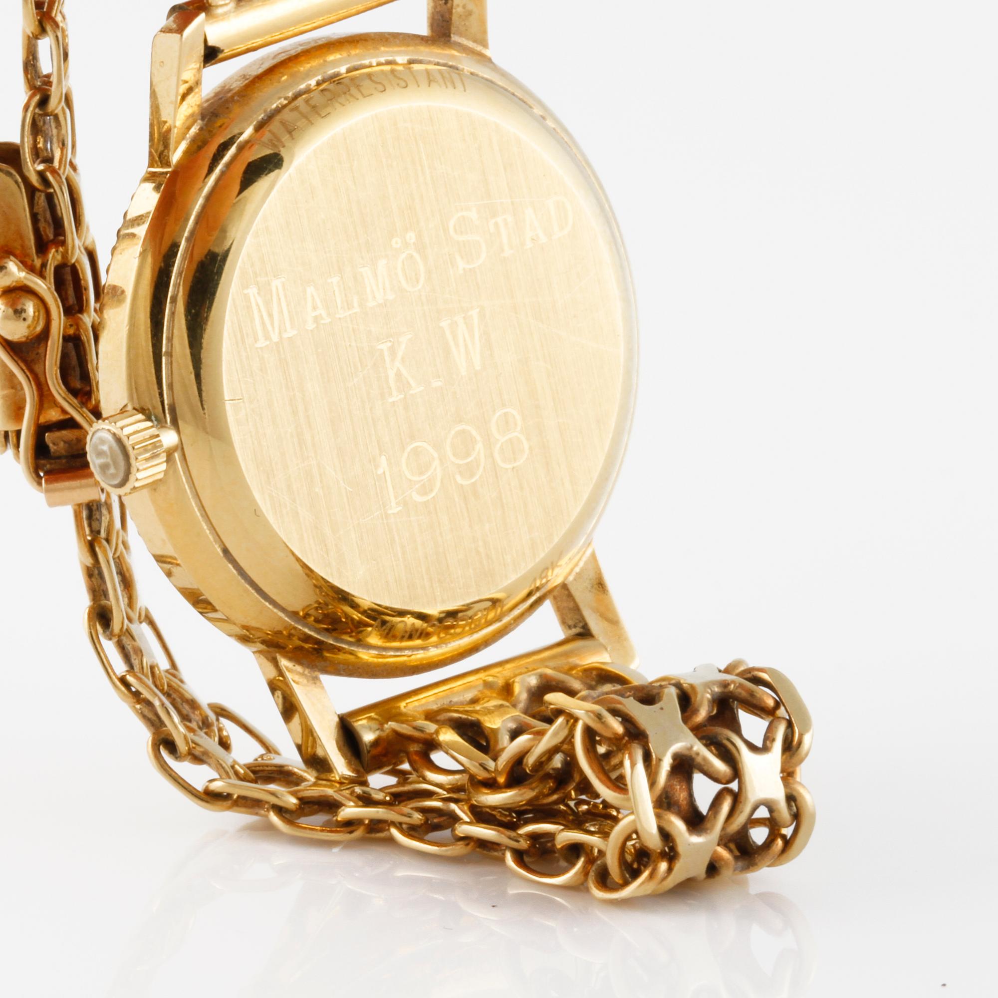 ARMBANDSUR, dam, 18 K guld, Tissot Goldrun. Vikt 23 g inkl extra länkdelar.