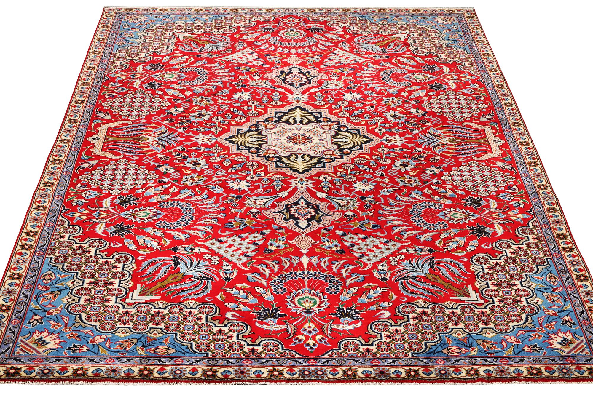 A Kashan carpet, c. 350 x 224 cm.