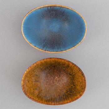 Gunnar Nylund, a set of five stoneware vases and two bowls and Carl-Harry Stålhane, a set of two vases for Rörstrand.