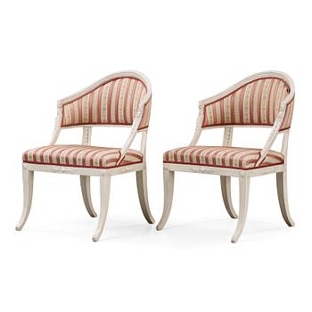 A pair of late Gustavian early 19th century armchairs.