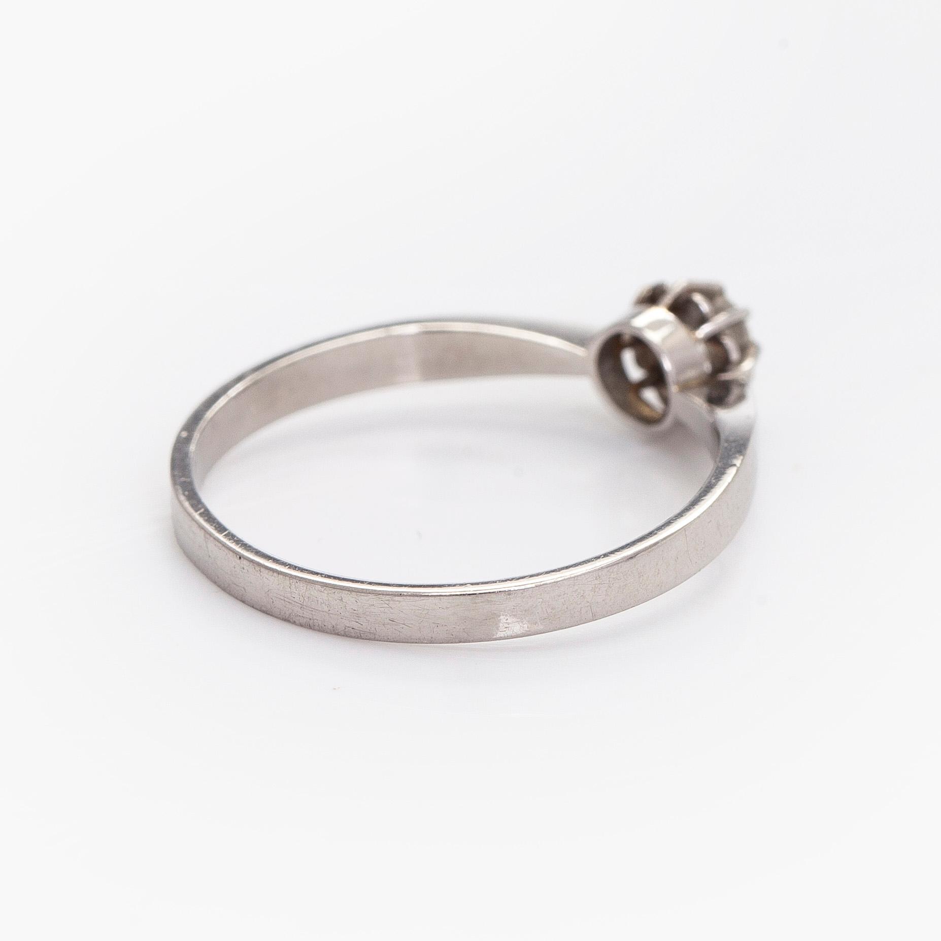 Ring, brilliant cut diamond, platinum, Peltonen & Kni, Helsinki.