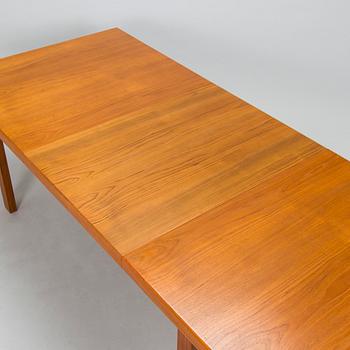 A mid-20th century dining table.