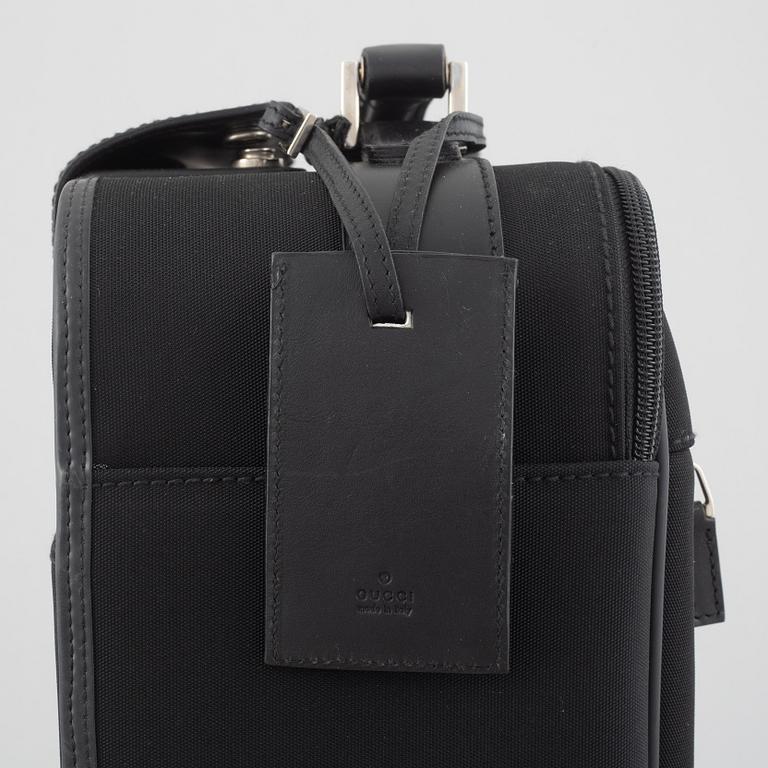 Gucci, suitcase/cabin bag.