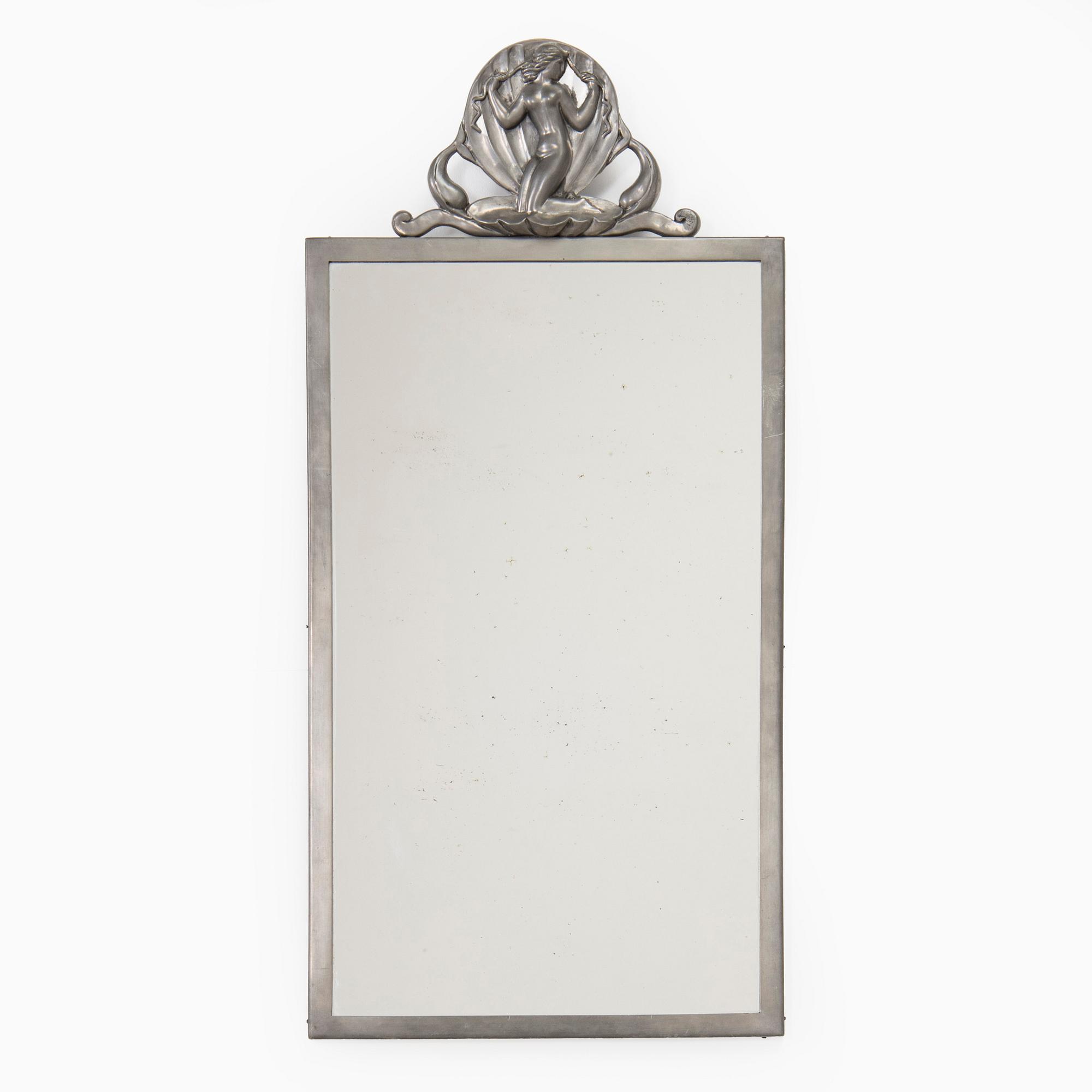 A Swedish Grace pewter wall mirror, Ystad Tenn (Ystad Metallindustri), Sweden 1929.