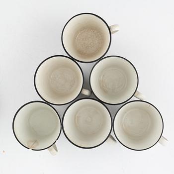 Eugen Trost, eleven coffee cups with three saucers, 'Zebra', Upsala-Ekeby Gefle.