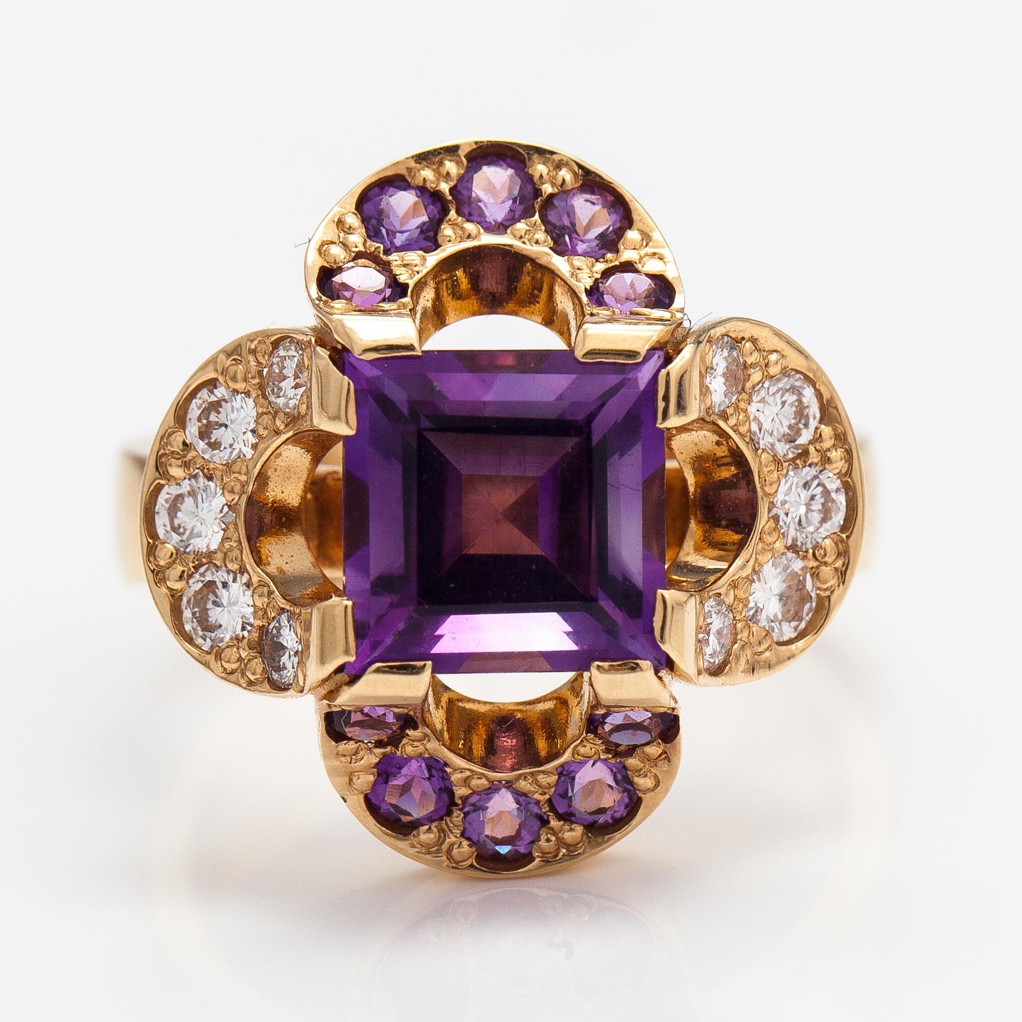 An 18K gold ring "Catherine Jagellion" with amethysts and diamonds ca. 0.37 ct in total. Ofelia Jewelry, Helsinki 1998.