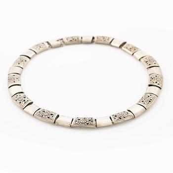 Silver necklace.