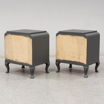 A pair of mid 20th century painted bedside tables.