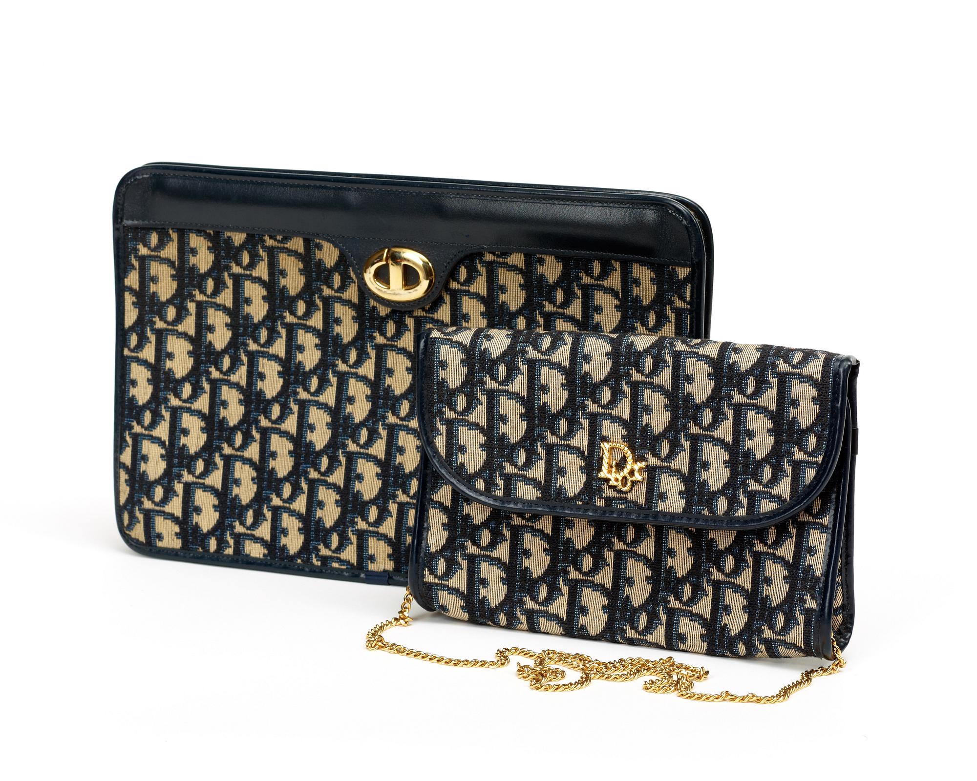 A monogram canvas evening bag and clutch by Christian Dior.