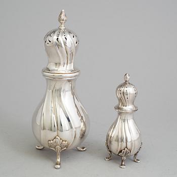 Two 20th century silver casters, one marked CG Hallberg, Stockholm 1938 and one with Swedish import marks.