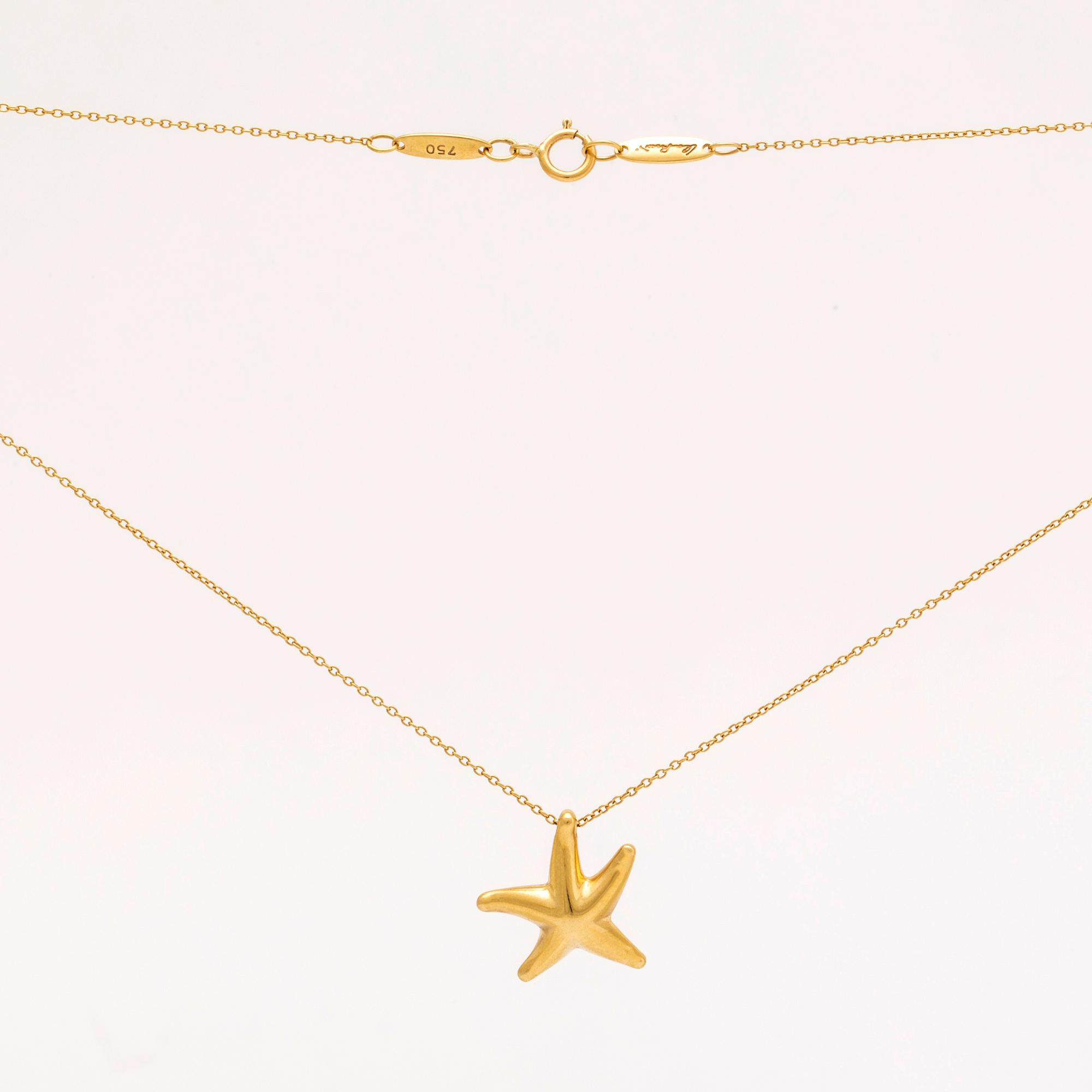 Tiffany & Co, necklace 18K gold, Elsa Peretti "Starfish" small approx 10 mm, original box, dustbag and shoppingbag.
