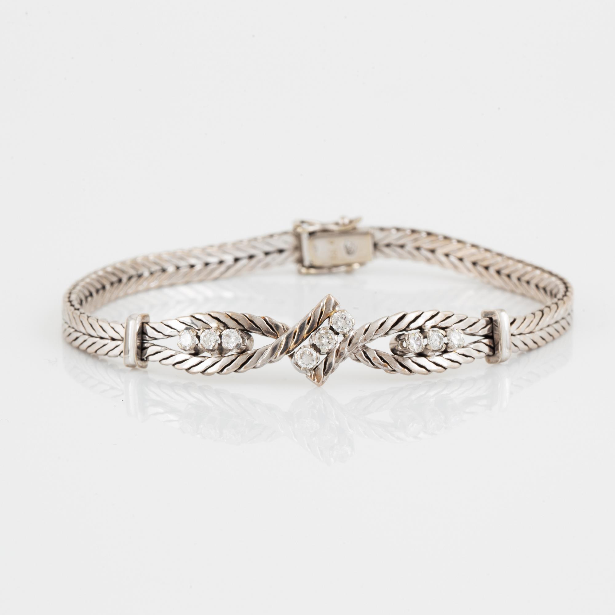 ARMBAND, med briljantslipade diamanter totalt 0.55 ct, importstämplat.