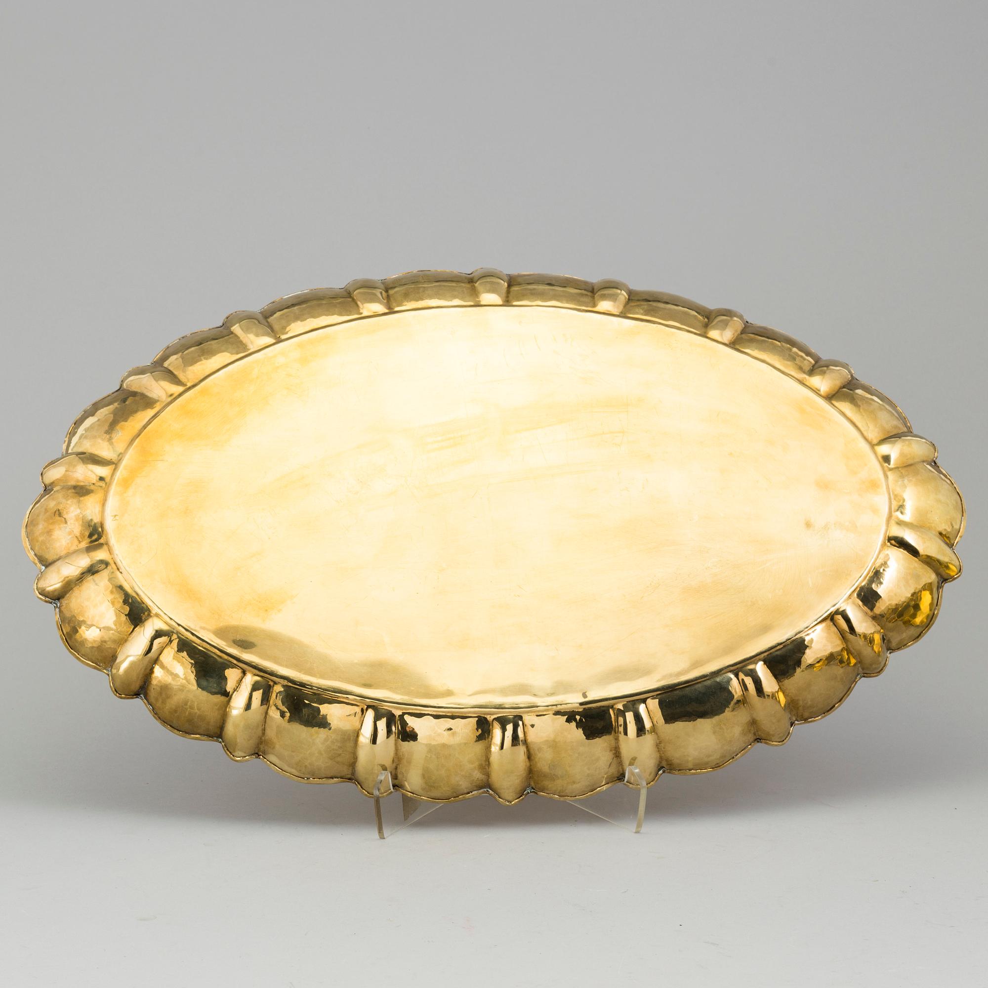 LARS HOLMSTRÖM, a brass tray and a set of 3 plates, from Arvika.