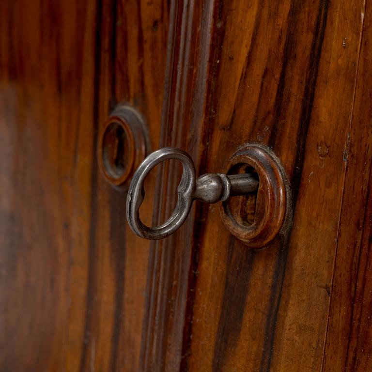 A 19th century walnut veneered  book cabinet.