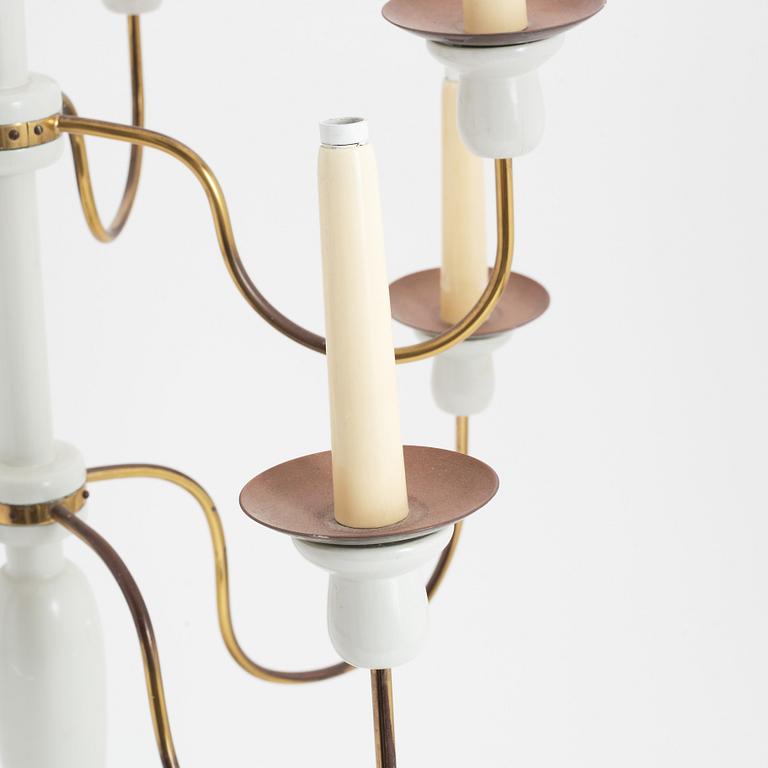 A painted wood and brass model 2586 candelabra by Josef Frank for Firma Svenskt Tenn.