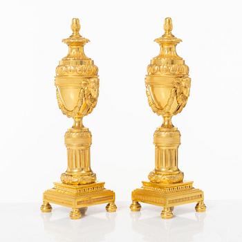 A pair of French Louis XVI style gilt-bronze casolettes, later part 18th century.