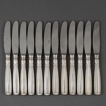 A set of 12 silver and steel knives, model Lotus, Denmark. 20th century.