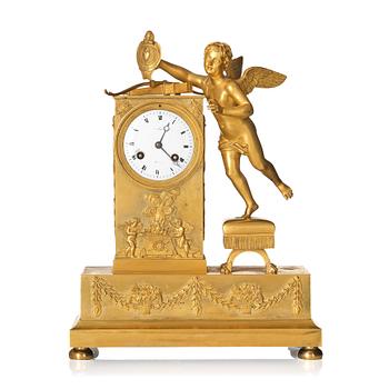 125. An Empire ormolu figural mantel clock, early 19th century.