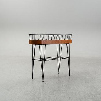 A 1950-60s plant stand.