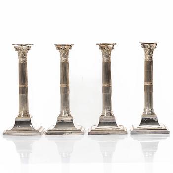 Four silver plated candlesticks, early 20th century.