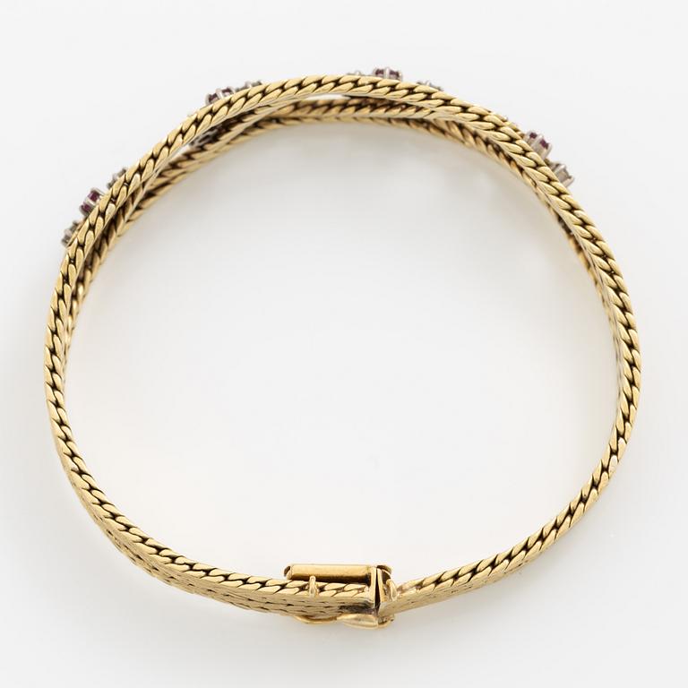 Bracelet 18K gold with diamonds and rubies.