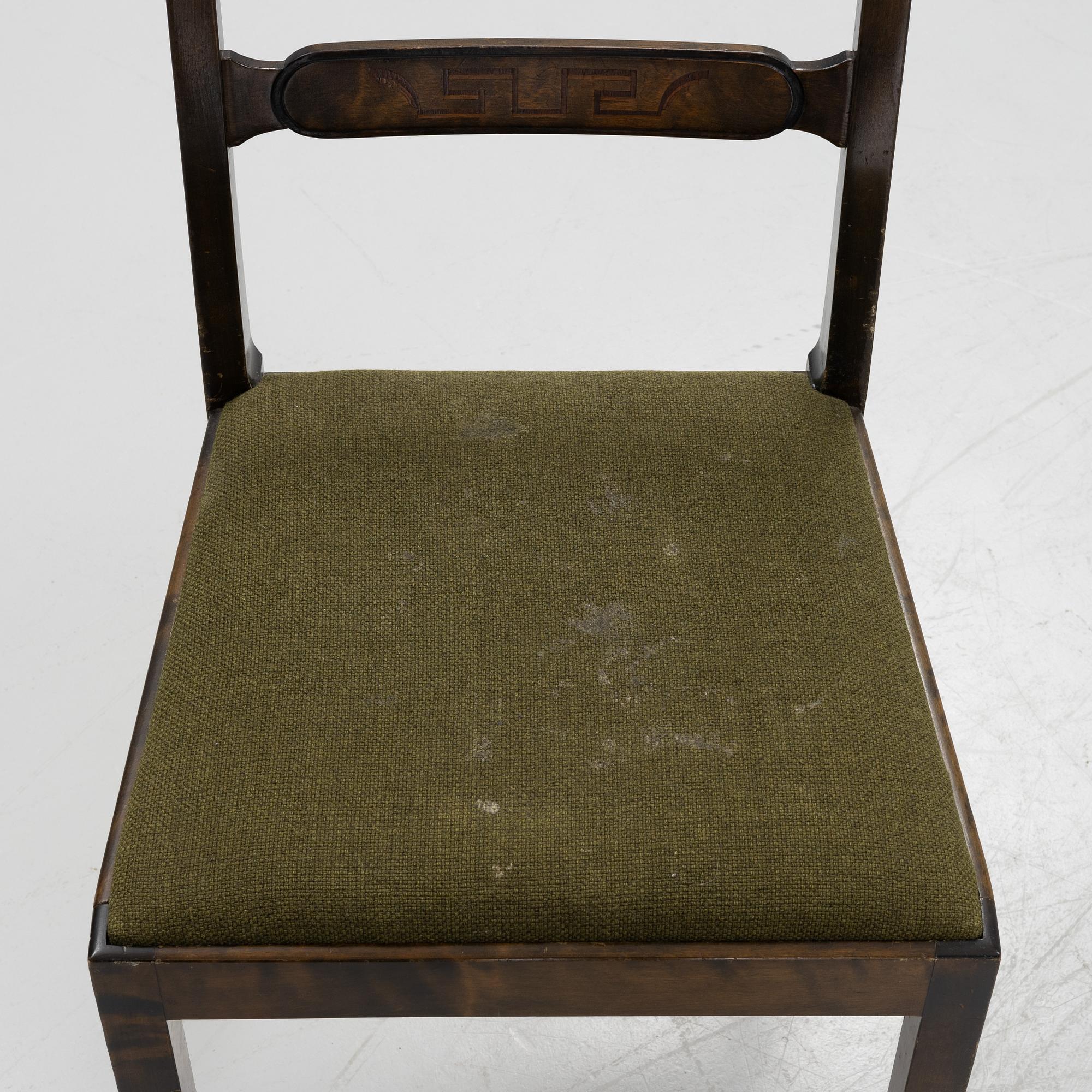 A Swedish Grace birch dining table and four chairs, 1920's/1930's.