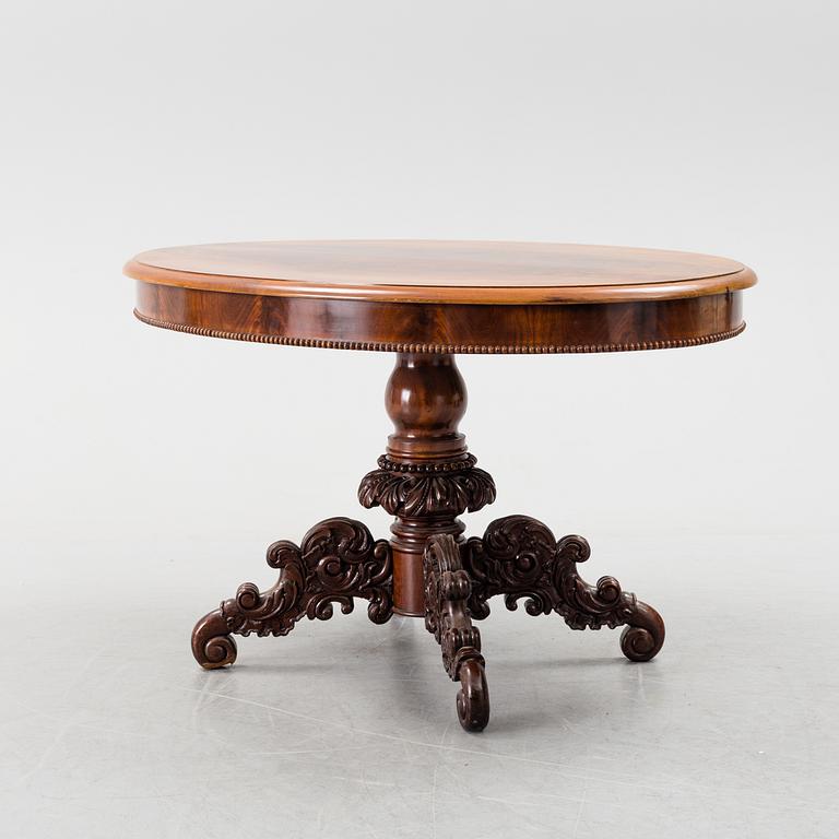 A mid 19th century mahogny table.