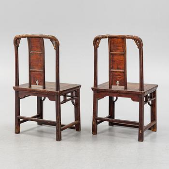 A pair of early 20th century chairs, China.