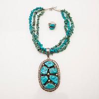 Necklace with pendant and ring, sterling silver set with turquoises.